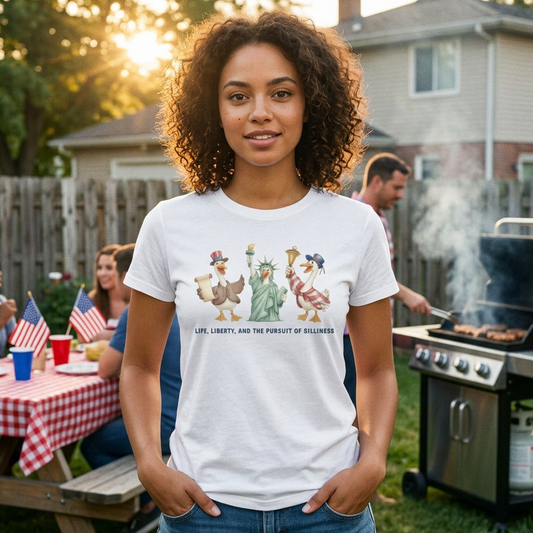 Woman wearing a t-shirt with a graphic design in a backyard setting
