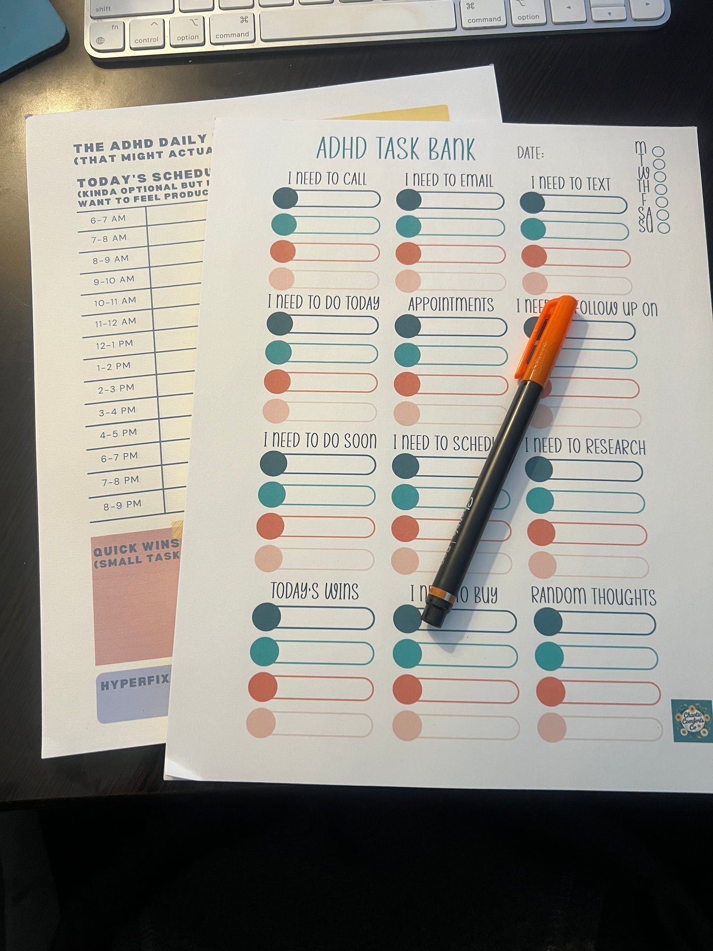 Sheet of paper with a colorful task ranking chart on a desk with a pen on top.